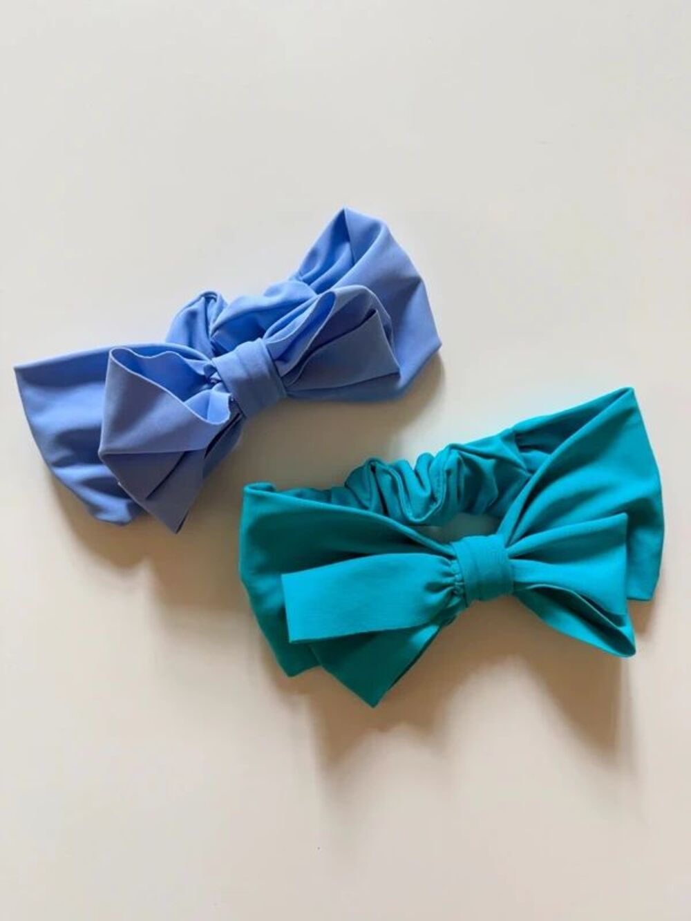 RuffleButts Girls UPF 50+ Swim Bow Headbands Teal + Light Blue